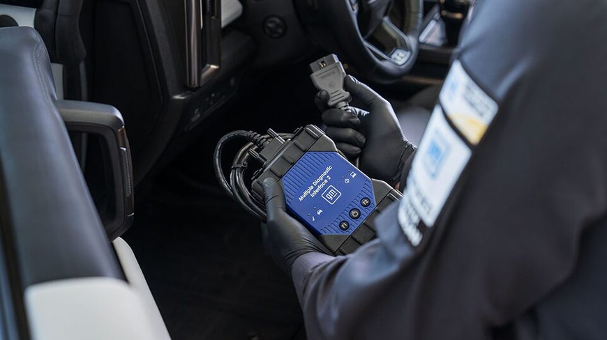 GMC Certified Service Technician Connecting a Multiple Diagnostic 2 Device to Obtain Vehicle Information
